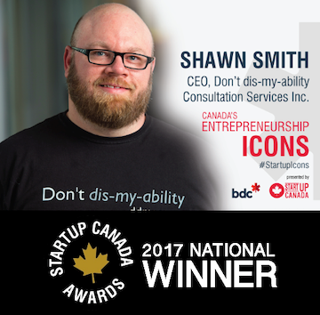 Informational card of Shawn Smith as Startup Canada Awards' 2017 Winner for Entrepreneurship Icons. Shawn Smith smiles while wearing a shirt that says "Don't dis-my-ability"